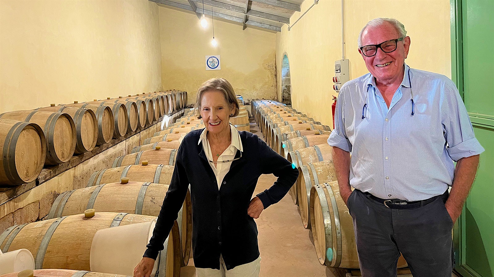  Peter Vinding-Diers and his wife, Susie, stand in the small barrel room of Vinding Montecarrubo